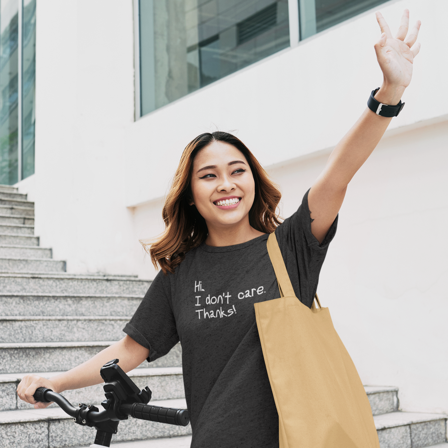 Exercise-t-shirt-Hi-I-Don_t-Care-Thanks-on-a-woman-carrying-a-tote-bag